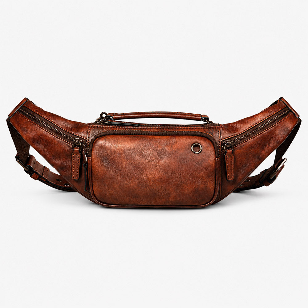 Front view of dark brown leather concealed carry fanny pack with long slim body, zipper hardware, and vintage leather finish