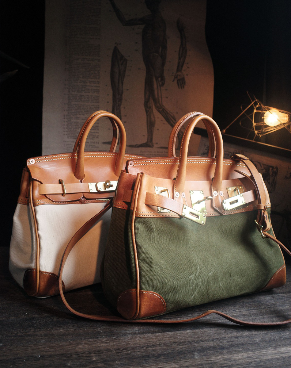 Two handbags, one white and one green with brown accents
