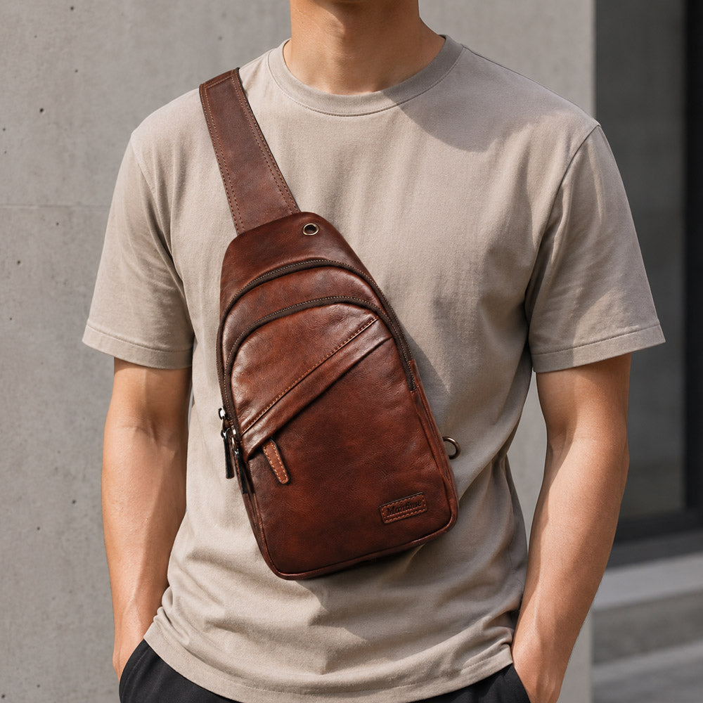 Deep brown leather waist bag worn crossbody on model, showing compact vintage styling for daily city carry