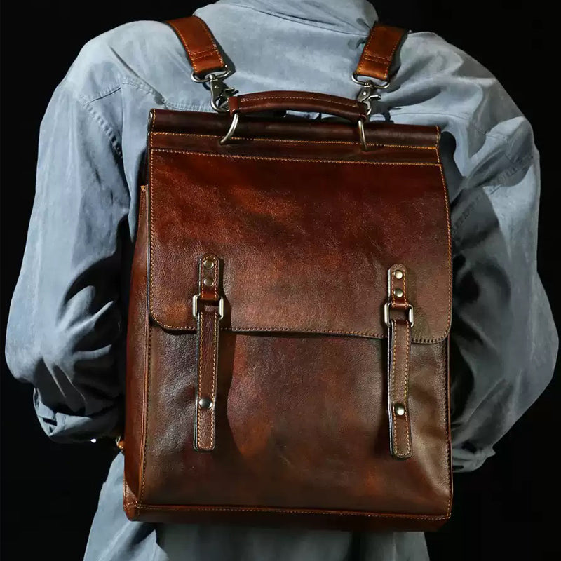vintage leather backpack is complemented by several smaller pockets to help you stay organized